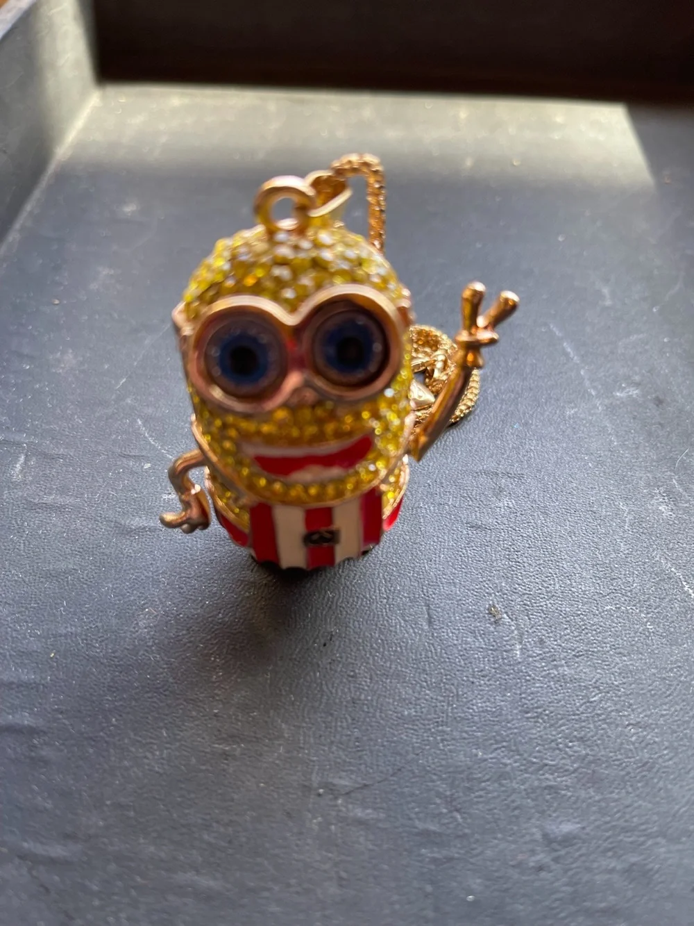 Minion Crystal Yellow Pendant with Red Stripe Overalls. His  Arms Move. NWOT